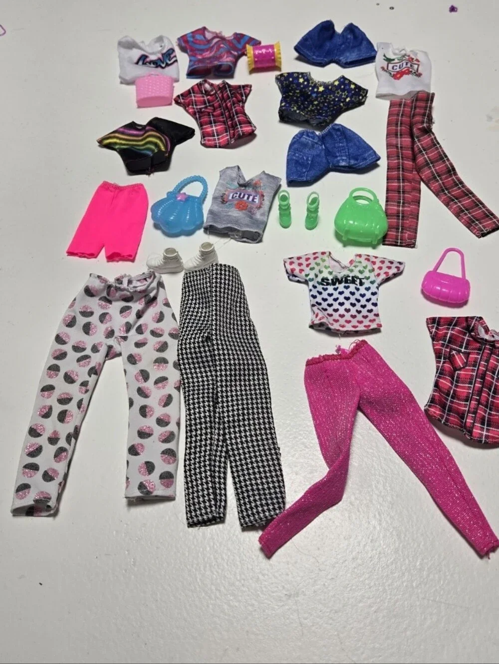Lot Of Barbie Clothes 4 pants 3 shorts 9 shirts 2 pairs shoes 5 purses